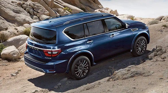 2023 Nissan Armada ascending off road hill illustrating body-on-frame construction. | Petro Nissan in Hattiesburg MS
