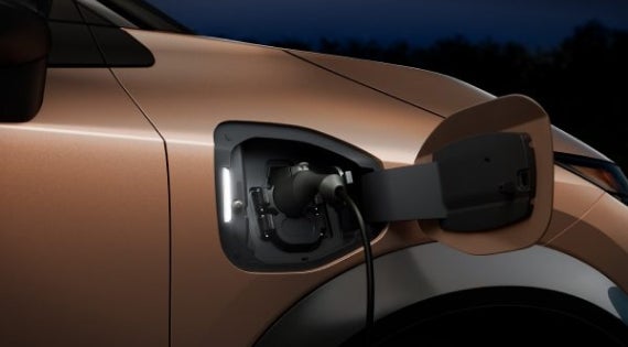 Close-up image of charging cable plugged in | Petro Nissan in Hattiesburg MS